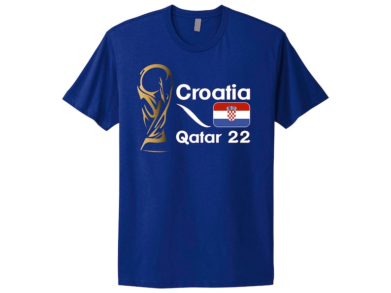 May include: A royal blue t-shirt featuring a gold World Cup trophy graphic, the text "Croatia", the Croatian flag, and the text "Qatar 22".