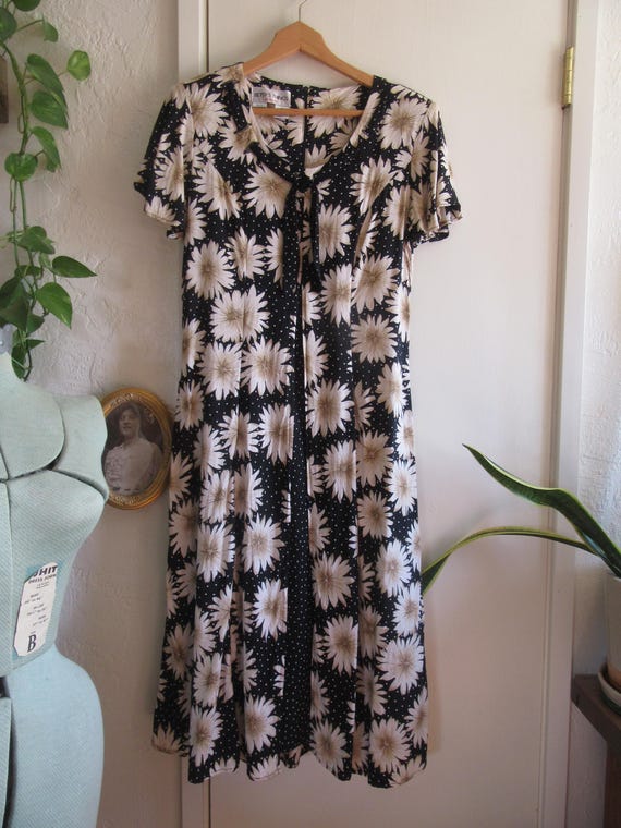 90s floral grunge dress Starina vintage 90s short sleeve button front cabbage rose/ grunge floral  pattern maxi dress with shoulder pads, size S $36 *Will be available in  store on our featured Instagram rack beginning Saturday