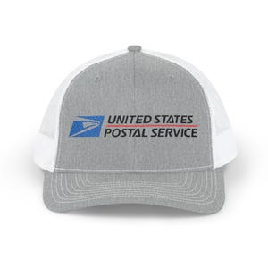 May include: A gray trucker hat with a white mesh back. The front of the hat features the United States Postal Service logo and text in blue, red, and black.