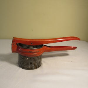 Antique Red Handle Potato Masher/Ricer Strainer