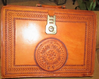 Figura tribal de maletín occidental de cuero vintage