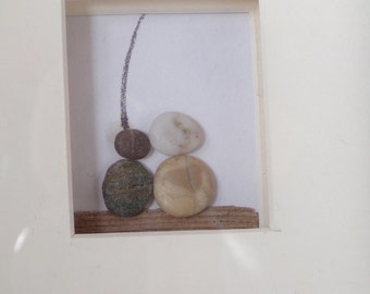 Pebble people, kite flying
