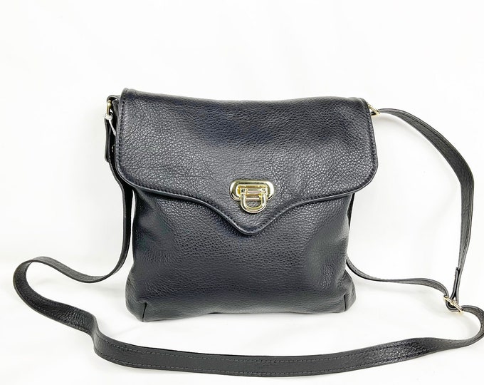 Handmade in Canada black pebbled leather cross body bag with flap and lock for daily use.