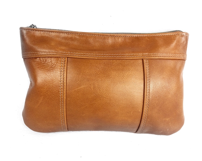 Light brown, caramel, or whiskey  coloured leather clutch for summer for day and evening