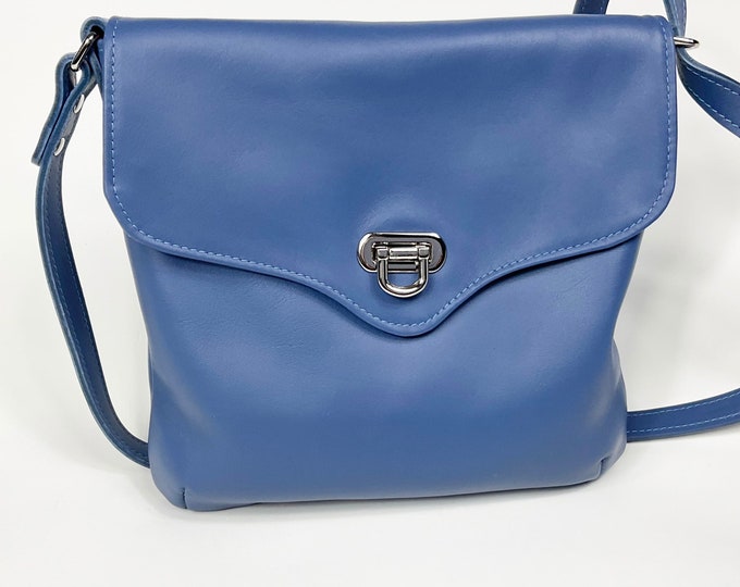 Hand made in Canada medium blue Italian leather cross body bag with a flap and flip lock