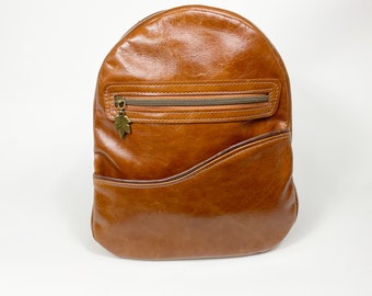 Handmade in Canada small Italian distressed cognac leather backpack for day use or day trip use.