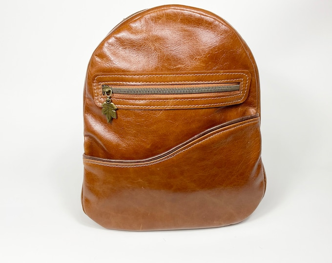 Handmade in Canada small Italian distressed cognac leather backpack for day use or day trip use.