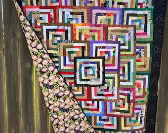 Scrappy half log cabin quilt