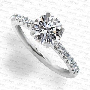 0.75ct Round Diamond Engagement Ring & 0.21ctw Side Diamonds. LR7616