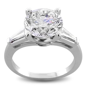 1.25 carat Round Diamond & 0.45 ctw Tapered Baguette Engagement Ring. LR7742