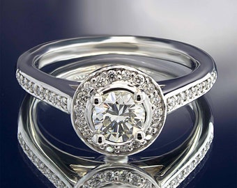 0.73 ctw Round Diamond Halo Engagement Ring. LR7276