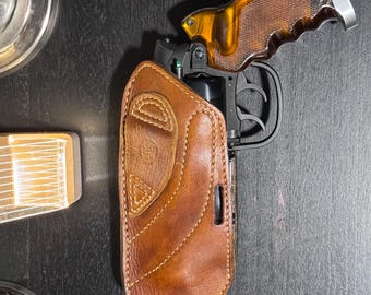Coldre BLADE RUNNER PKD da F&G Customs - Coldre Rick Deckard - Diversas opções de alça, incluindo tiras de retenção de metal estilo Safariland.