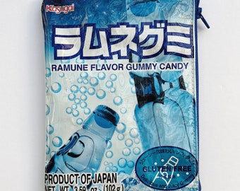 102g Ramune Soda Flavoured Confectionery Bag from Japan. Our zippered bags are fully lined and covered in a durable and hard wearing PVC.