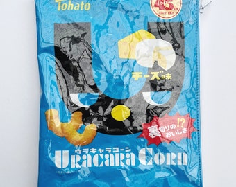 70g Uracara Corn Cheese Flavoured Snack Bag from Japan. Our zippered bags are fabric lined and covered in a durable PVC.