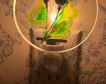 Luz nocturna con efecto de brillo verde