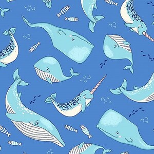 May include: A blue and white seamless pattern featuring various sea creatures, including whales, a narwhal, and fish. The background is a solid blue color.