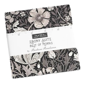 May include: A pack of fabric squares featuring a black and white floral pattern. The fabric is labelled "Ebony Suite Best of Morris" by Barbara Brackman.