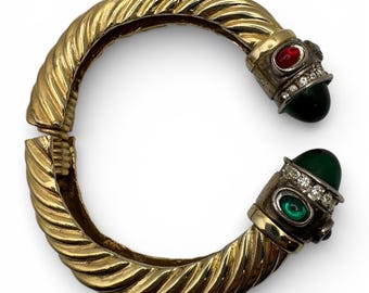 Pulsera de resorte estilo Ciner vintage en tono dorado con cabinas en tonos joya y diamantes de imitación