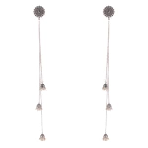 May include: A pair of silver dangle earrings with three small bells on each earring. The bells have a silver finish and are decorated with intricate designs.