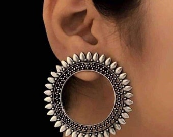 German silver shop earrings jhumkas