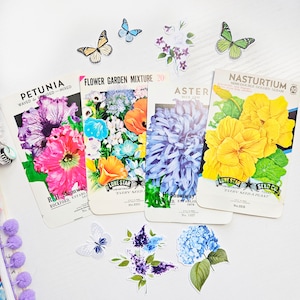May include: Assortment of vintage seed packets featuring colorful illustrations of flowers. The packets include Petunia, Flower Garden Mixture, Aster, and Nasturtium. Each packet has the name of the flower, a description, and the company name "Lone Star Seed Co."