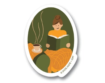 Vinyl Sticker | Peaceful Reading // Person with messy bun reading and drinking coffee or tea in a cozy chair with blanket in autumn colors.
