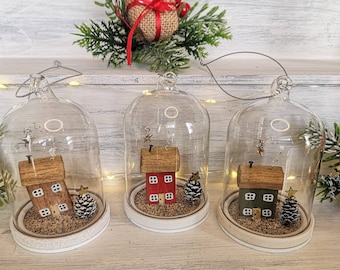 Hanging Glass bell jar with Handmade Wooden Christmas Cottage and Christmas Tree.