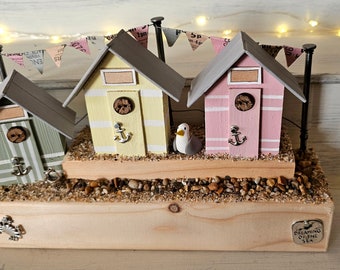 Pastel Coloured Beach Hut Scene with Seagull in Green, Yellow and Pink