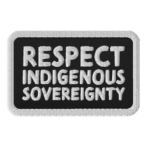 May include: Black and white embroidered patch with the text "RESPECT INDIGENOUS SOVEREIGNTY" in white.