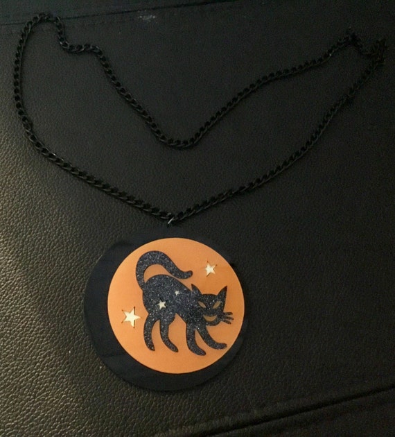 Large glittery cat on orange moon with stars necklace acrylic