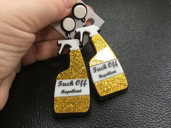 Novelty f*** o** repellant earrings gold glitter detail