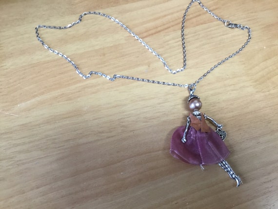 Doll necklace