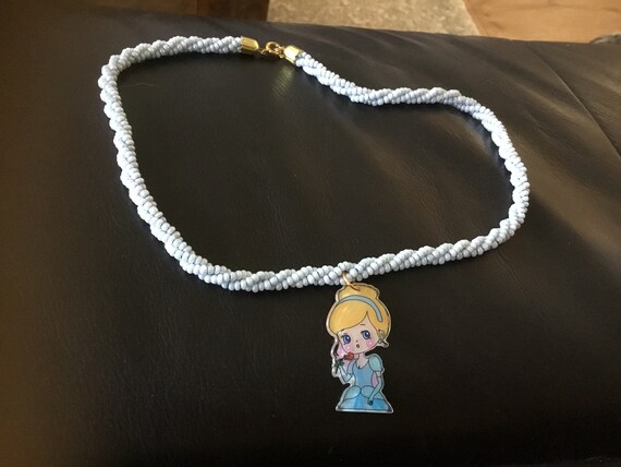 Vintage necklace with cinderella charm attached