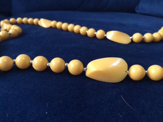 vintage yellow plastic long necklace