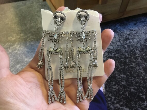 Large halloween spoooky skeleton moving limbs earrings glitzy
