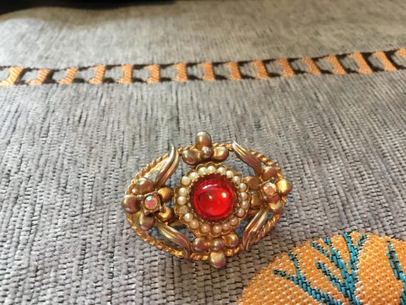 victorian revival 1960s ish brooch with central red stone surrounded by faux pearls
