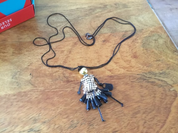 doll necklace goldtone