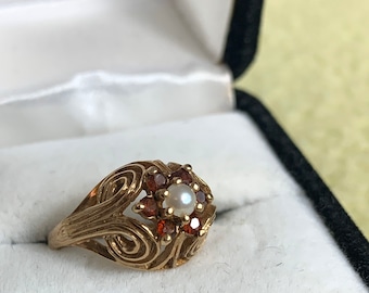 Stunning ruby and seed pearl ring