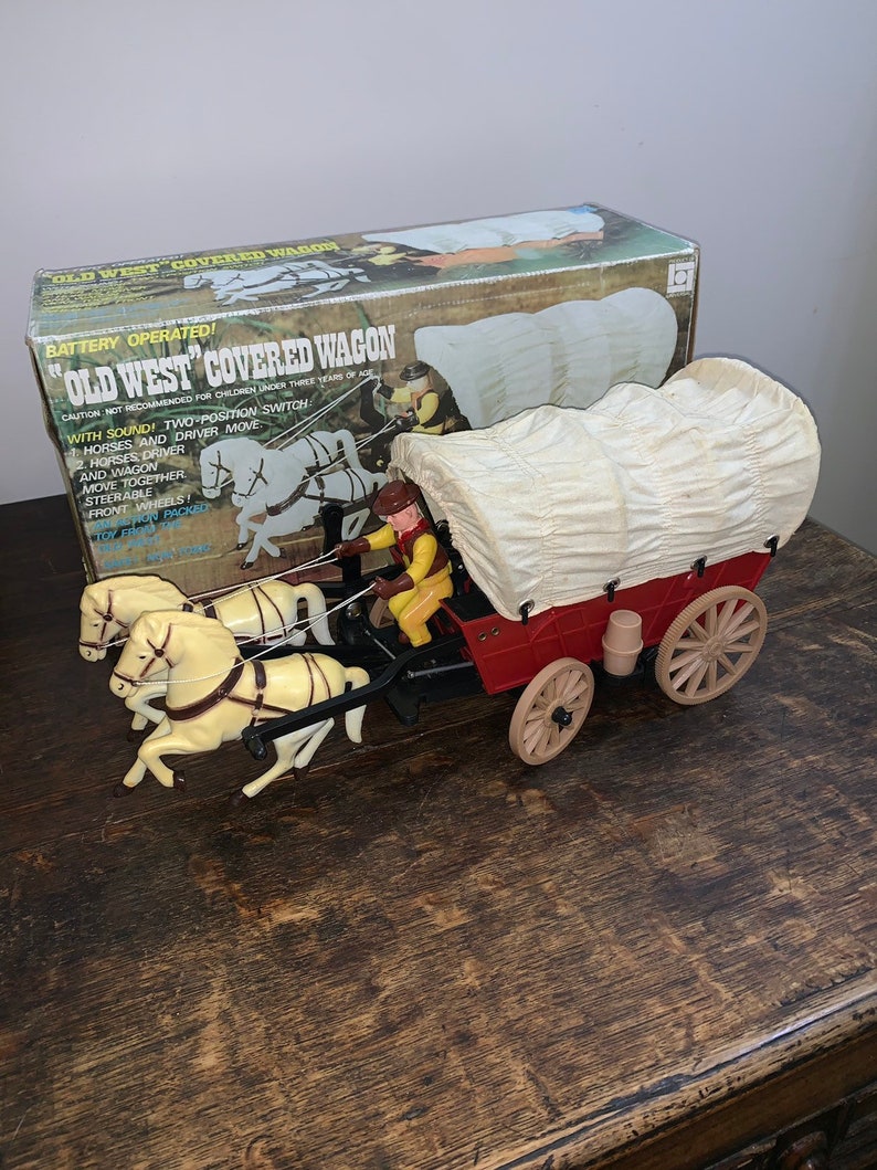 Universal old west covered wagon plastic toys boxed original Etsy