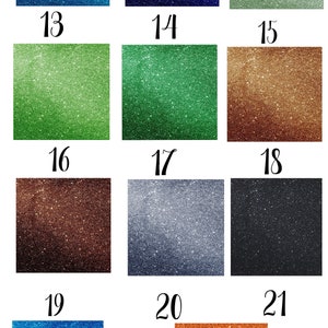 May include: A collection of 10 glitter swatches in various colours, including blue, green, brown, silver, and black. The swatches are numbered 13 through 23.