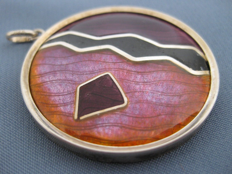 Sterling silver pendant with cloisonne enamel.