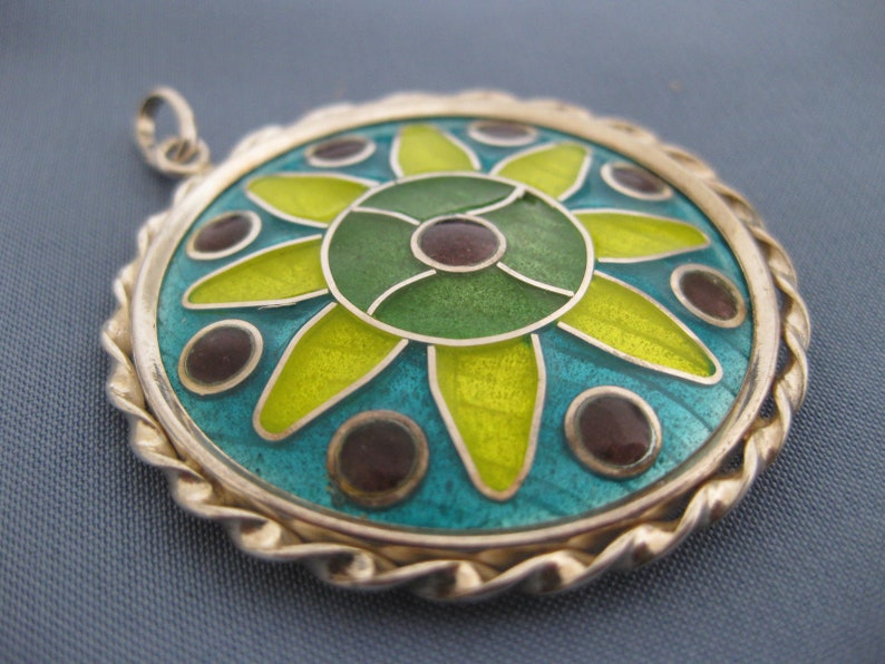 Sterling silver pendant with enamel.