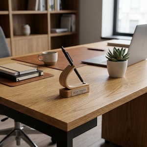 ash pen holder on office desk