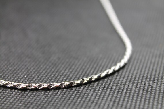 Sterling Silver Rhodium Plated Diamond Cut Rope Chain Necklace 2.2mm Sterling Silver Rhodium Plated Diamond Cut Rope Chain Necklace 2.2mm
