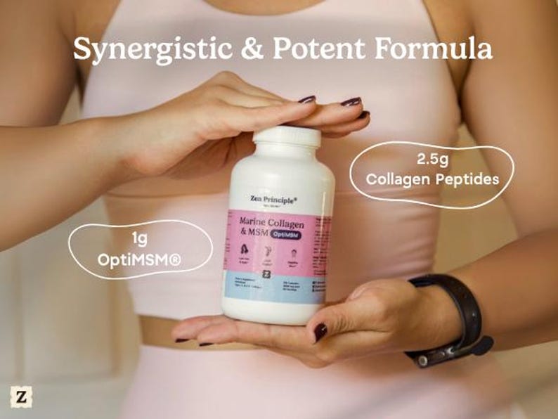 May include: A white bottle of Zen Principle Marine Collagen & MSM OptiMSM is held in front of a person. The bottle has a pink and blue label. Text on the image reads "Synergistic & Potent Formula", "1g OptiMSM", and "2.5g Collagen Peptides".
