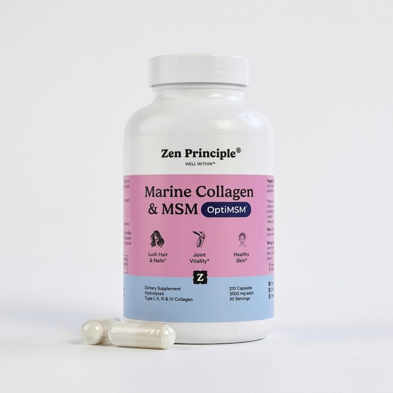 May include: A white bottle of Zen Principle Marine Collagen & MSM OptiMSM dietary supplement. The label is pink and blue, with text indicating benefits for hair, nails, joint vitality, and skin. Two capsules are in front of the bottle.