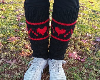 Knitted black leg warmers with red heart pattern