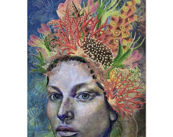 May include: A woman's face is surrounded by a colorful coral reef. The coral is red, orange, green, and purple. The woman's eyes are blue and her skin is pale.