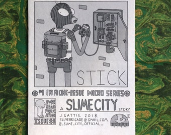 May include: A black and white comic book cover with a character wearing a black mask and a backpack. The character is holding a device and looking at a panel with electrical components. The title of the comic is "Stick" and the subtitle is "A Slime City Story".