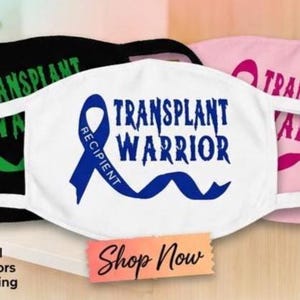 May include: White face mask with the words "TRANSPLANT WARRIOR" in blue, a blue ribbon, and the word "RECIPIENT". Other masks in black and pink are visible. A "Shop Now" sticker is at the bottom.